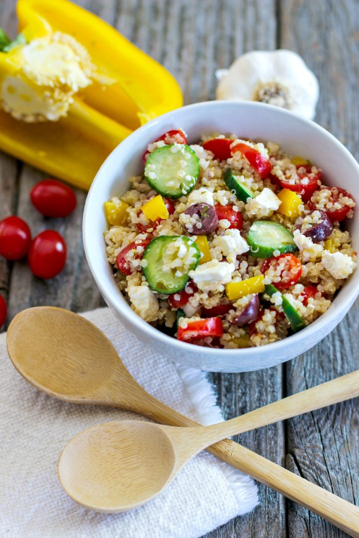 bowl of quinoa salad with feta and colorful veggies