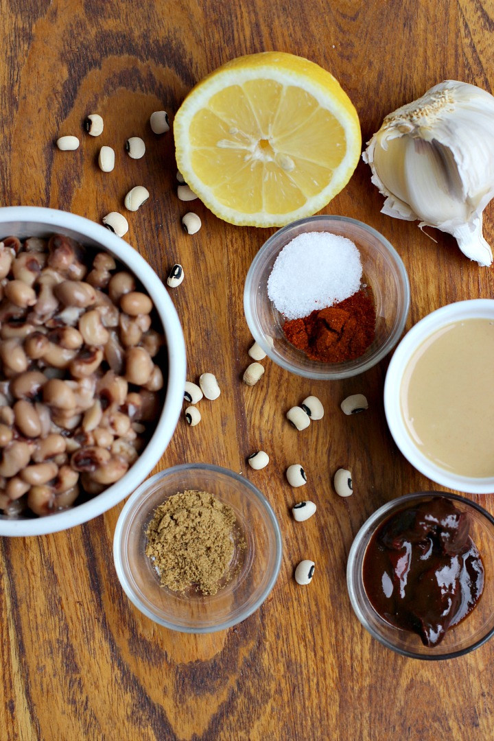 bowl of black eyed peas, lemon, garlic, tahini, cumin, salt, smoked paprika and chipotle pepper